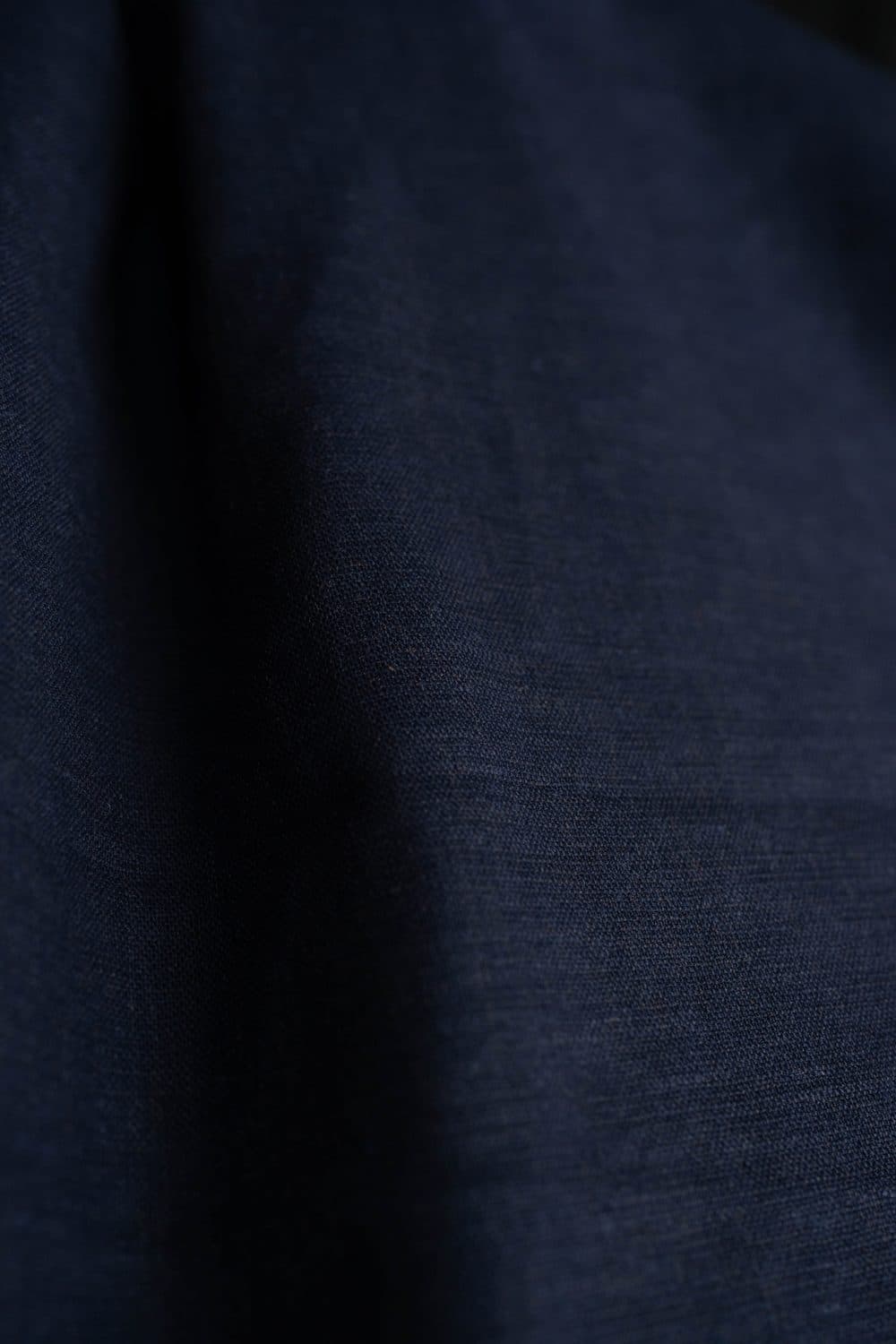 Close-up of deep navy Cintamani linen