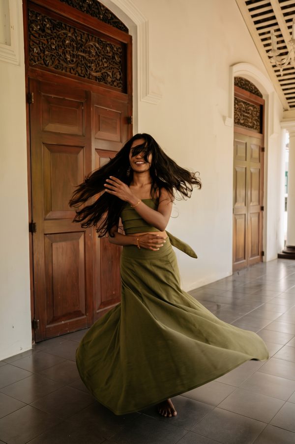 Olive linen in motion in the Walawwa hallway
